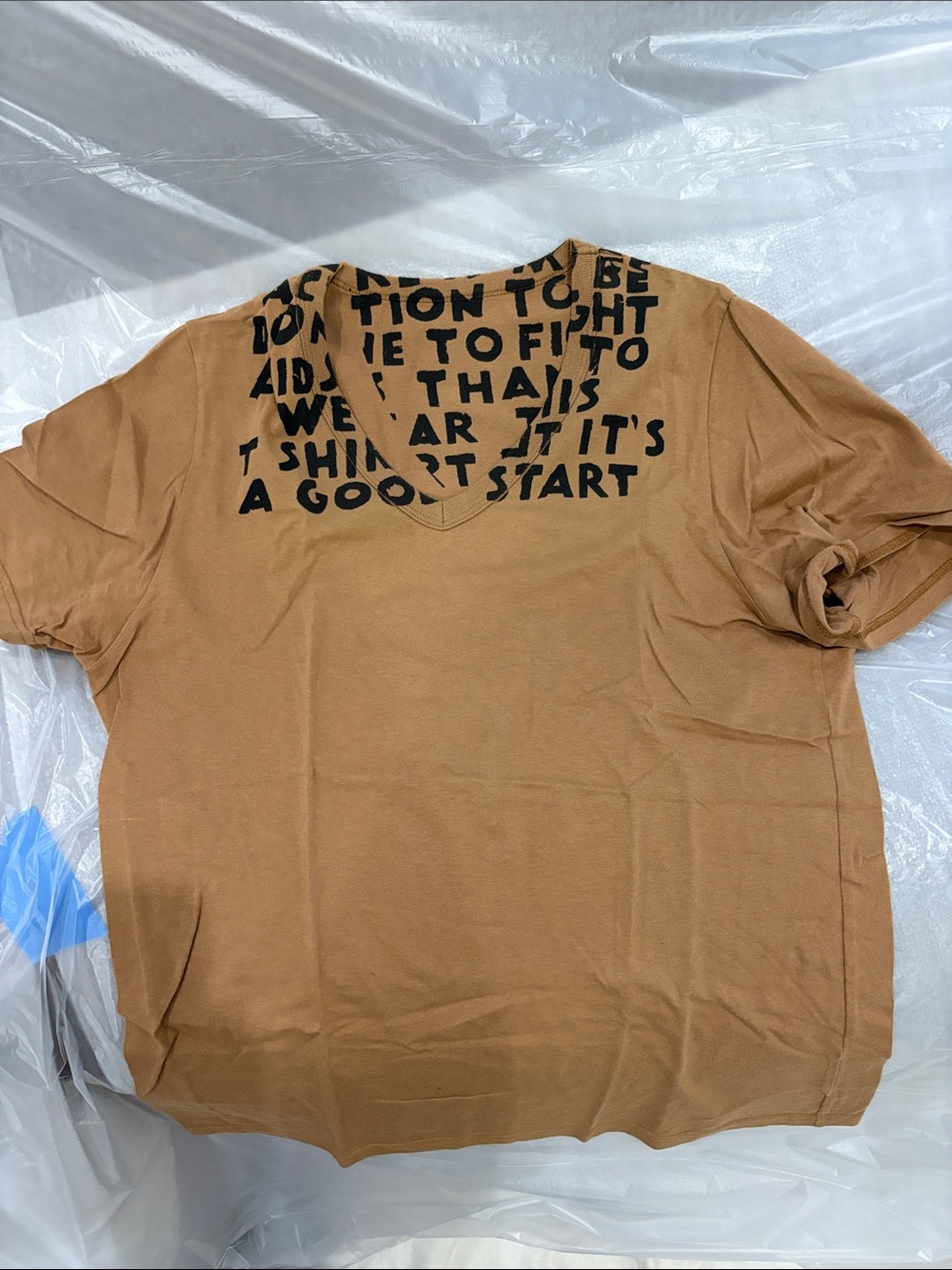 NYC Men's V-Neck Graphic Tee in Tan with Black Text